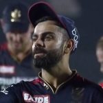 Virat Kohli gives a flying kiss to?