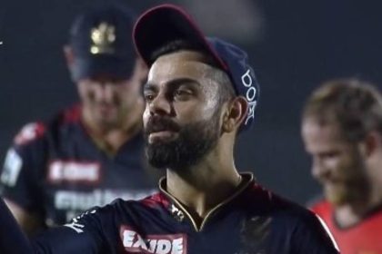 Virat Kohli gives a flying kiss to?