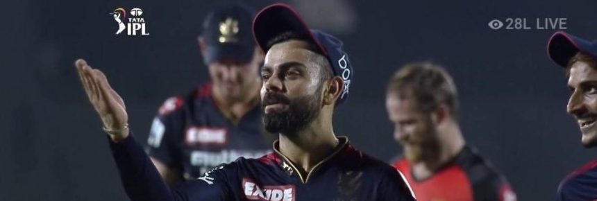 Virat Kohli gives a flying kiss to?