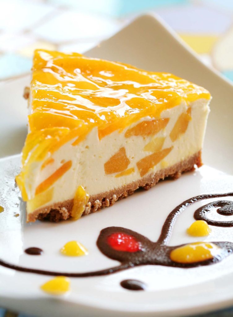 13. Mango Cheesecake End your mango feast with a stunning Mango Cheesecake. A buttery graham wafer crust, a creamy cheesecake filling and a delicious layer of mango puree create a dessert that's as lovely as it is delicious.